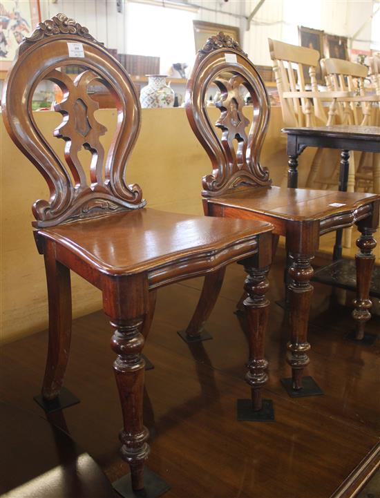 Pair Victorian mahogany hall chairs